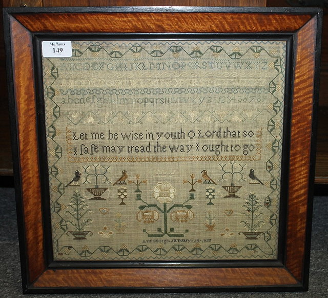 Appraisal: A needlework sampler by Ann George dated in original frame