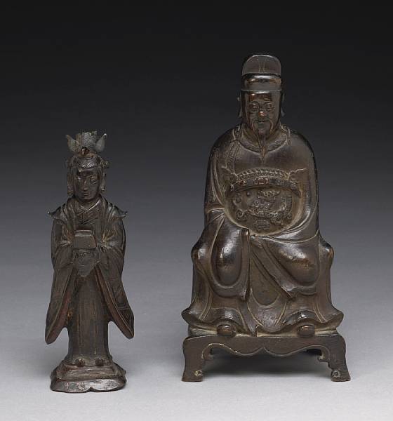 Appraisal: Two small patinated bronze Daoist figures th th Century The