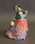 Appraisal: A Royal Doulton figure of 'Autumn Breezes' painted HN in