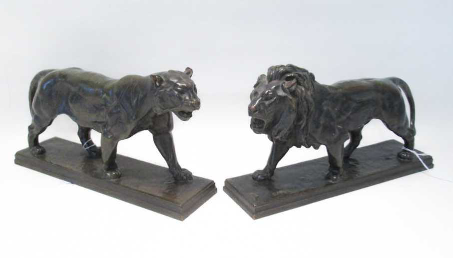 Appraisal: TWO BRONZE SCULPTURES AFTER ANTOINE-LOUIS BARYE France - Lion Qui