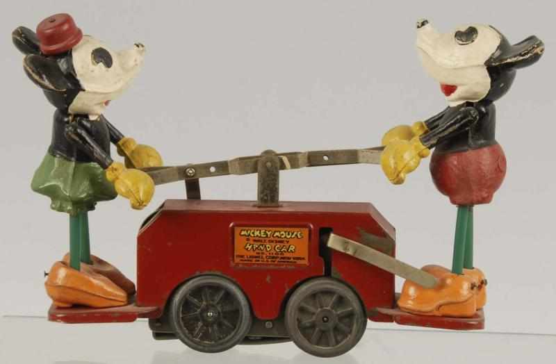 Appraisal: Lionel Mickey Minnie Mouse Handcar Wind-Up Toy Description American Working