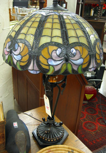 Appraisal: A HAND CRAFTED STAINED AND LEADED GLASS TABLE LAMP with