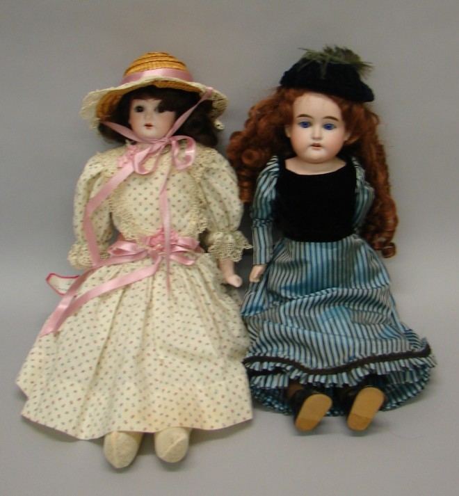 Appraisal: Pair of shoulderhead dolls Germany Holz-Masse symbol Brown sleep eyes