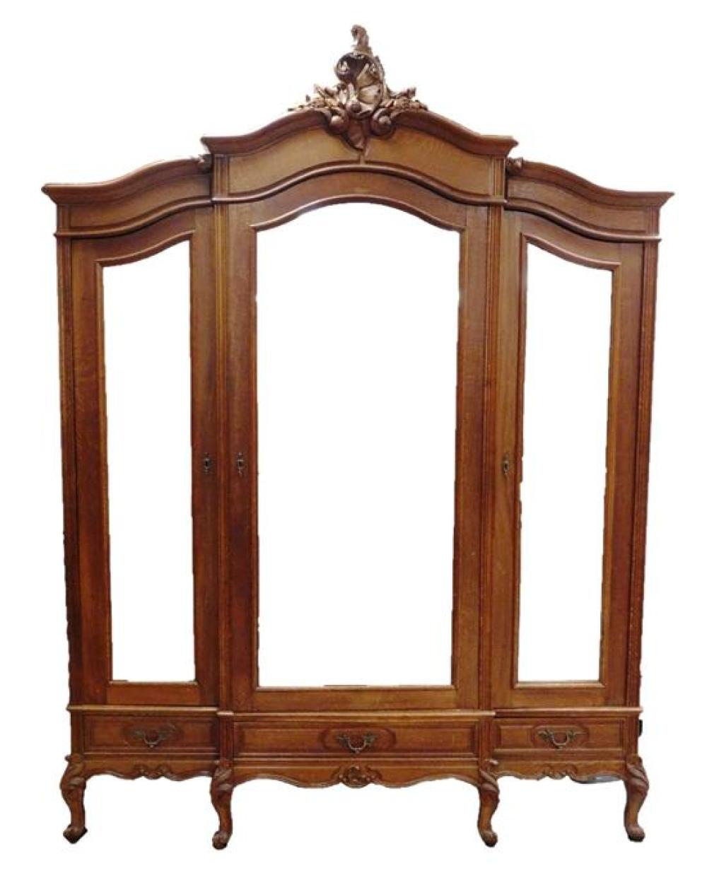 Appraisal: Louis XV style armoire three doors with beveled mirrors each