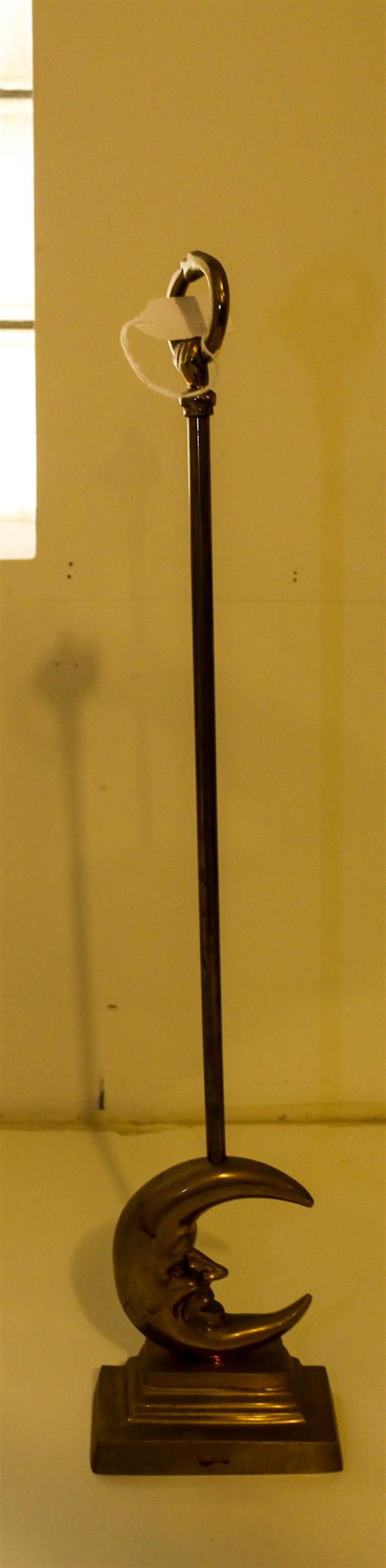 Appraisal: Sale Lot A Gilt Metal Doorstop with base in the