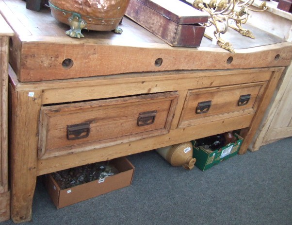 Appraisal: A large th century pine and beech butchers block the