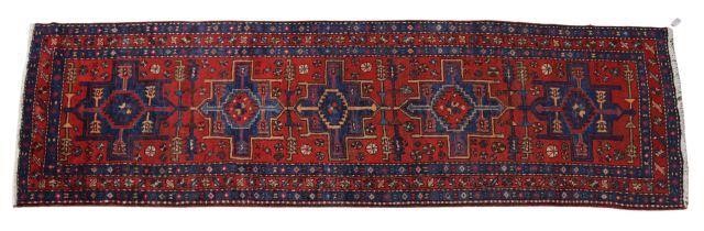 Appraisal: Hand-tied Persian Serapi runner approx ' l ' w