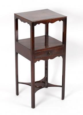 Appraisal: A George III mahogany pot stand the central tier fitted