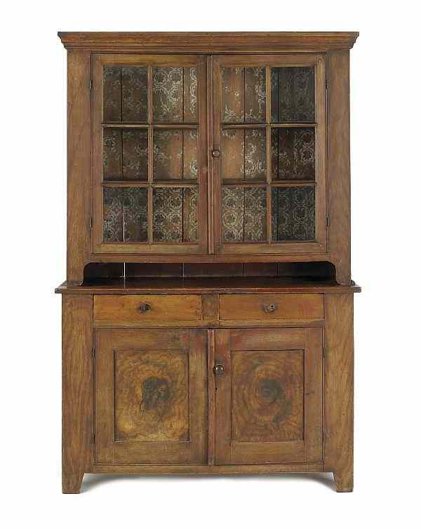 Appraisal: Pennsylvania painted pine two-part Dutch cupboard ca retaining an old