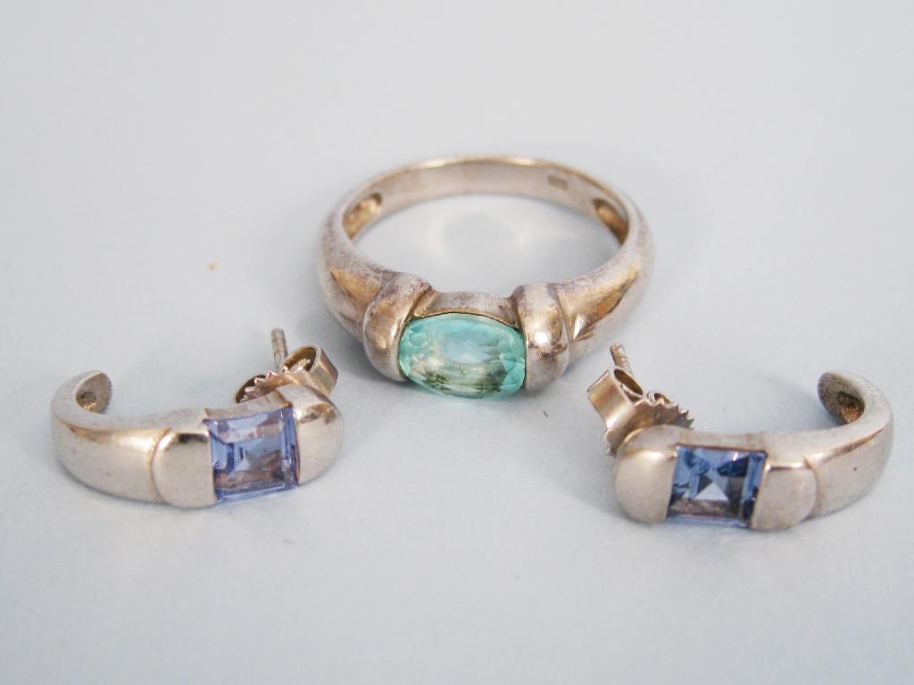 Appraisal: A blue Topaz Ring with pair of similar Earrings in