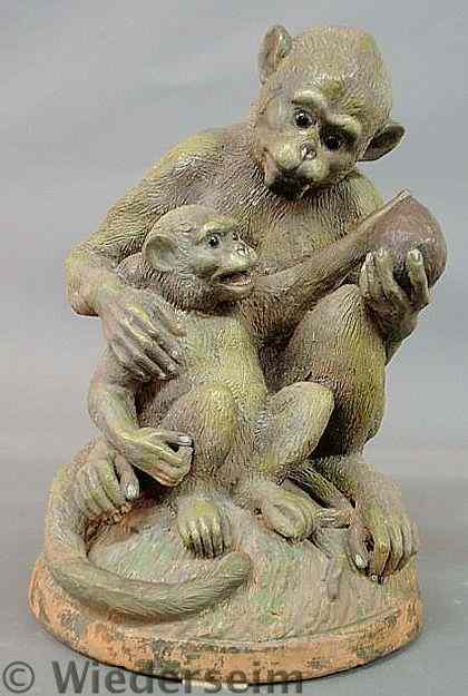 Appraisal: Nicely detailed terracotta figural group of a seated monkey with