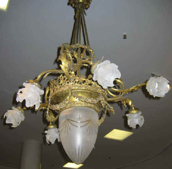 Appraisal: FRENCH DESIGN CHANDELIER Gilt metal with seven lights central light