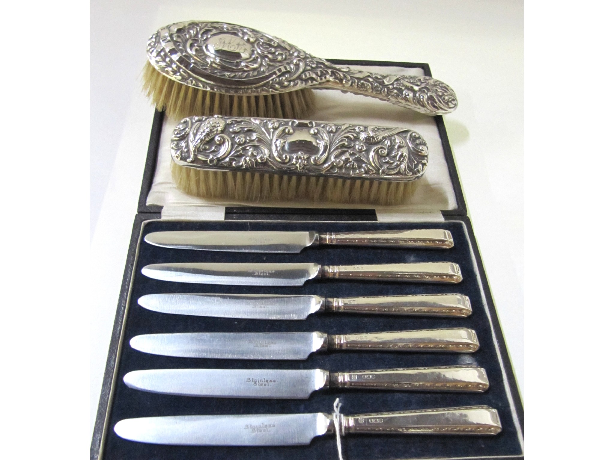 Appraisal: A lot comprising a cased set of six silver handled