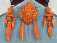 Appraisal: A fine suit of Victorian carved coral jewellery comprising a