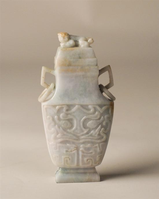 Appraisal: A Pale Marbled Green Carved Jade Lidded Vessel having a