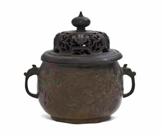 Appraisal: A Bronze Censer of circular form having raised decoration of