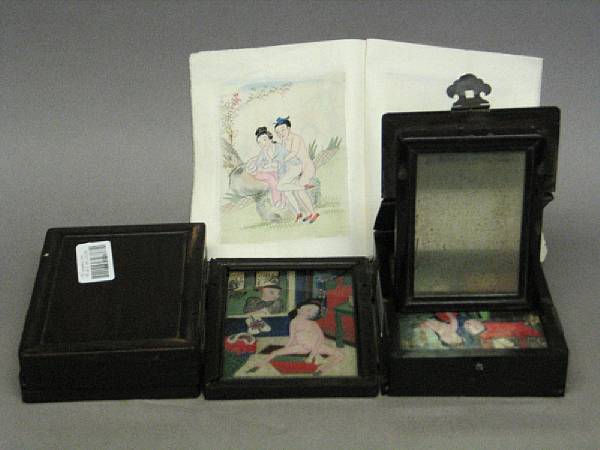 Appraisal: A folding hardwood table box with reverse-glass painted erotic scenes