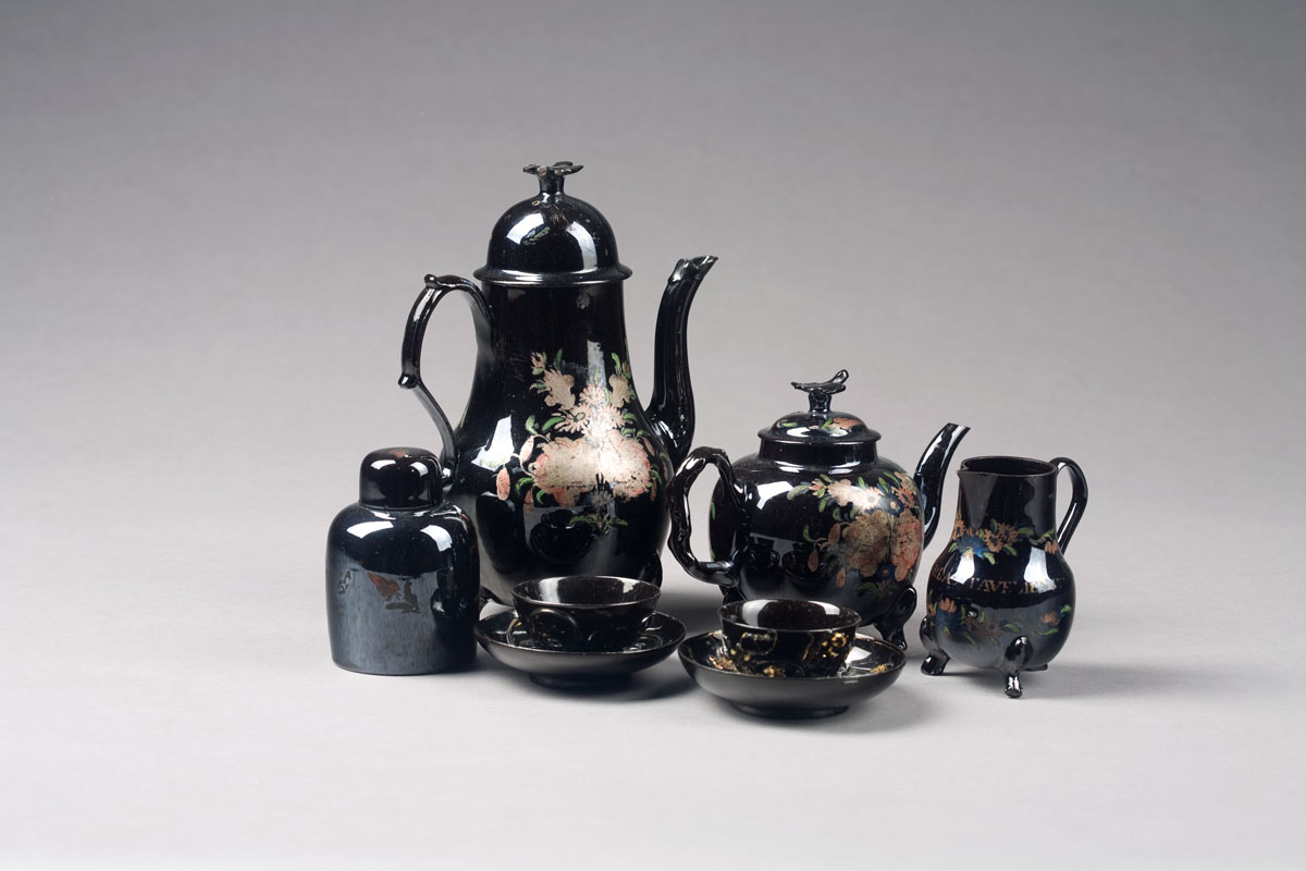 Appraisal: RARE STAFFORDSHIRE BLACK-GLAZED BROWN STONEWARE PART TEA SERVICE DATED Comprising