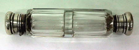 Appraisal: A VICTORIAN CLEAR GLASS FACET CUT WHITE METAL MOUNTED DOUBLE