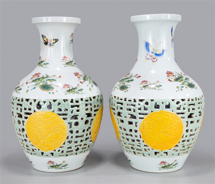 Appraisal: Pair of enameled porcelain vases each with reticulated section of