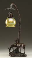 Appraisal: GERMAN BRONZE LAMP Wonderful bronze lamp base depicts two sculptured