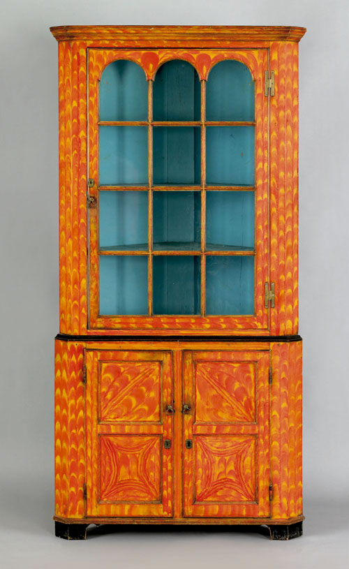 Appraisal: Exceptional Pennsylvania painted poplar two part corner cupboard early th