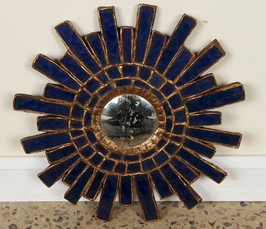 Appraisal: GILTWOOD BLUE GLASS SUNBURST MIRROR LINE VAUTRIN A giltwood and