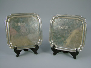 Appraisal: A pair of George III Irish silver waiters Dublin of