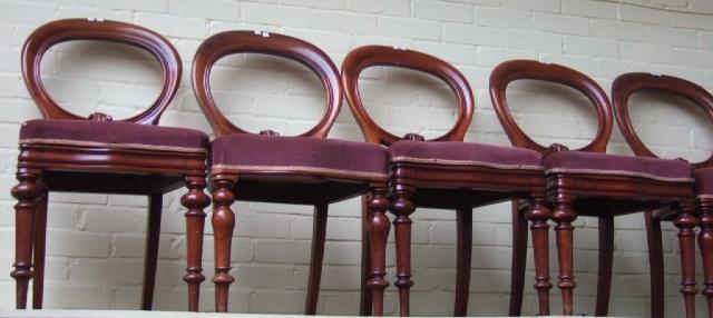 Appraisal: Two sets of four Victorian mahogany spoon back dining chairs