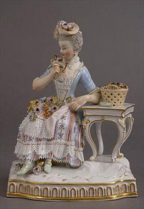 Appraisal: MEISSEN PORCELAIN GROUP Modeled as an th century girl seated