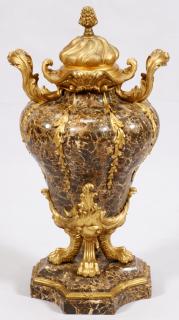 Appraisal: ROCOCO-STYLE VENEERED MARBLE AND GILT GESSO COVERED URN H L