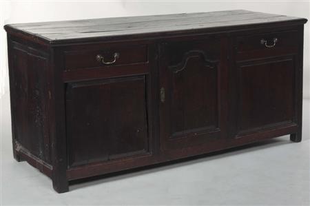 Appraisal: An th century oak dresser base the moulded plank top