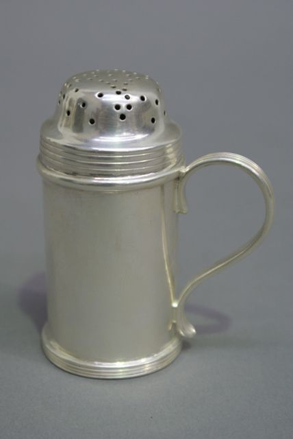 Appraisal: A George III Sterling Silver barrel-shaped pepper shaker with domed