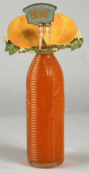 Appraisal: Cardboard Orange Crush Bottle Topper with Bottle Description Includes nice