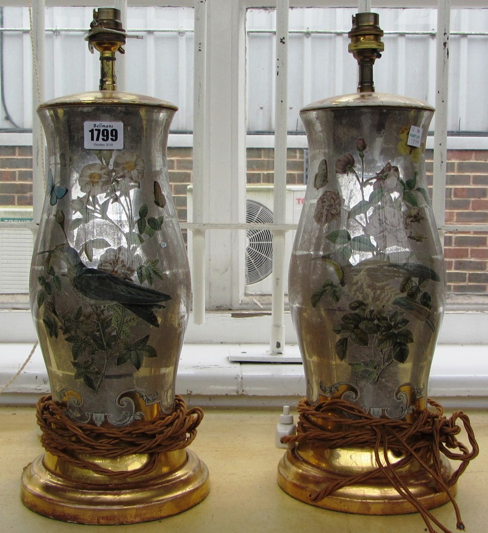 Appraisal: A pair of decalcomania silvered glass baluster lamps late th