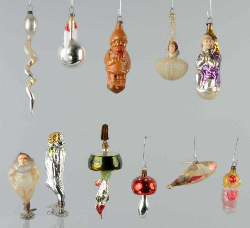 Appraisal: Lot of Fish Christmas Ornaments Description Includes rare clip-on elf