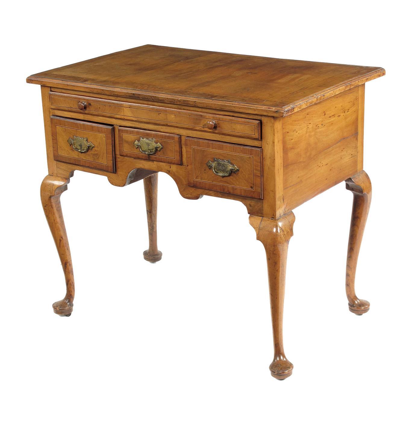 Appraisal: An early th century walnut lowboy