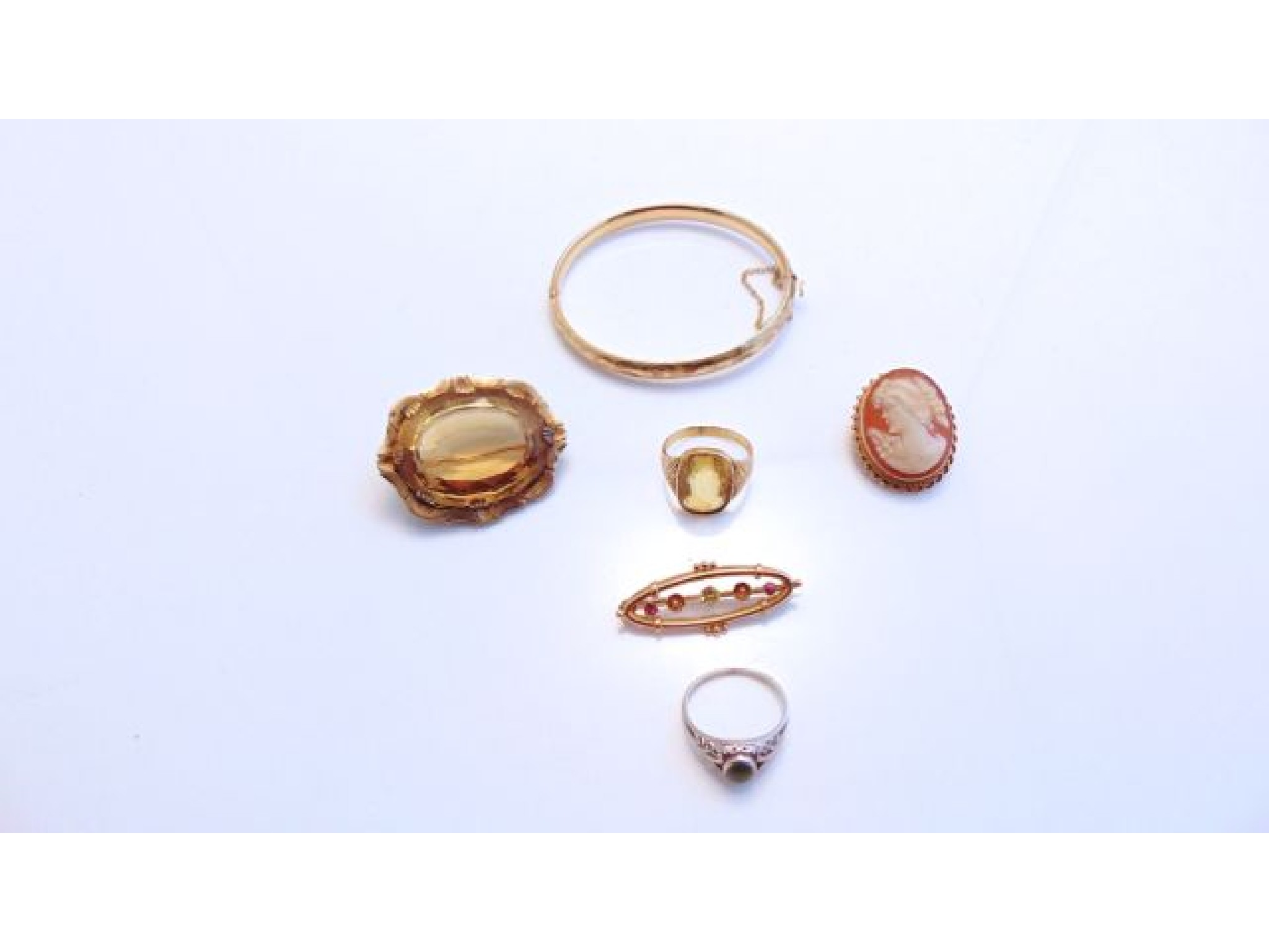 Appraisal: A ct gold hinged bangle g a ct gold paste-set