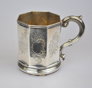 Appraisal: A Victorian octagonal silver Christening mug with engraved decoration and