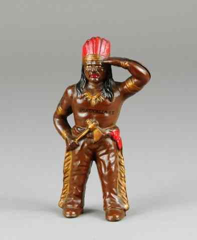 Appraisal: INDIAN WITH TOMAHAWK STILL BANK Hubley souvenir example from Monticello