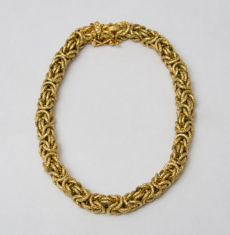 Appraisal: K TEXTURED GOLD KNOTTED LINK BRACELET Stamped ' ' in