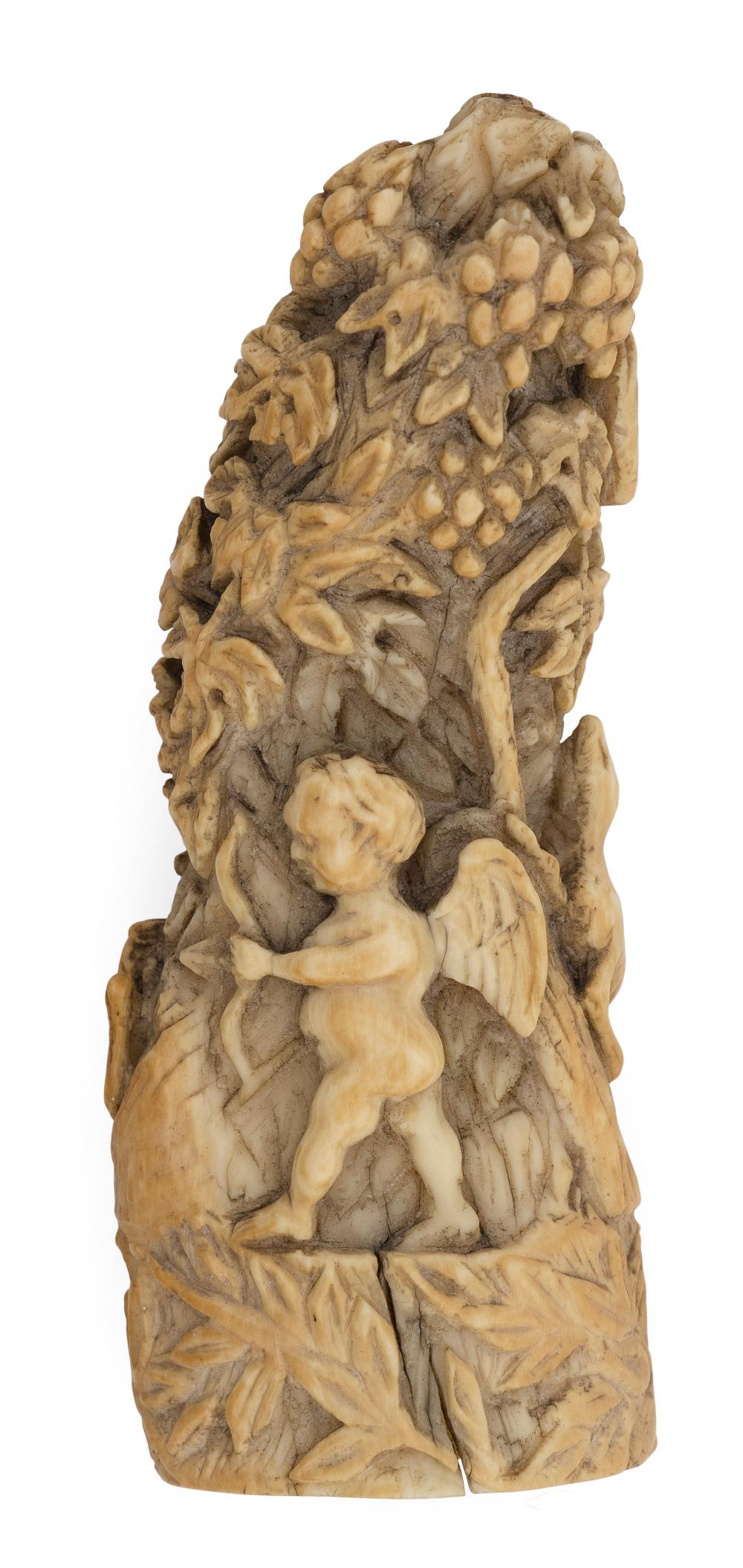 Appraisal: RELIF-CARVED WHALE'S TOOTH DEPICTING CUPID TH CENTURY LENGTH RELIF-CARVED WHALE'S