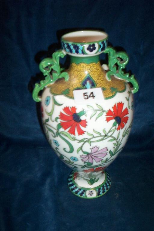 Appraisal: An early th century -handled cream ground vase in the