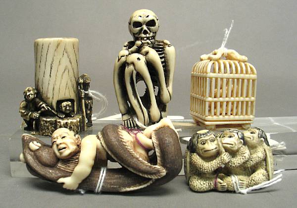 Appraisal: Five tinted ivory netsuke Including a crouching human skeleton a