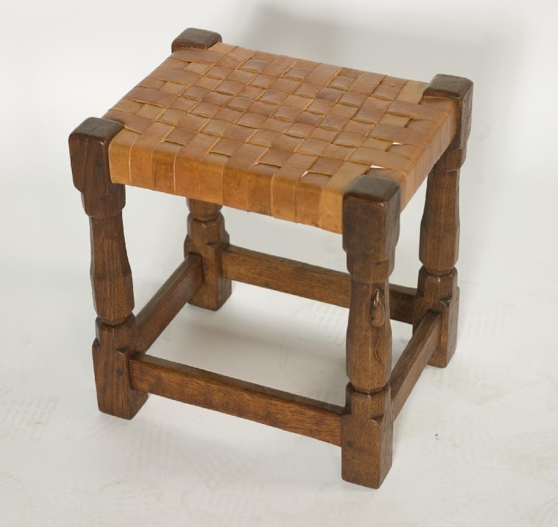 Appraisal: 's ROBERT MOUSEMAN THOMPSON OAK STOOL the rectangular lattice-work leather