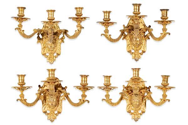 Appraisal: Four Regence style gilt bronze wall lights A set of