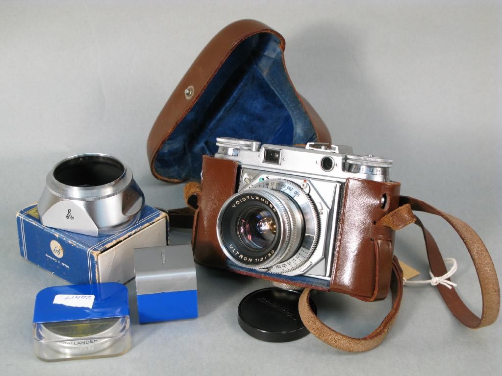 Appraisal: A Voigtlander Prominent SLR camera and three accessories -