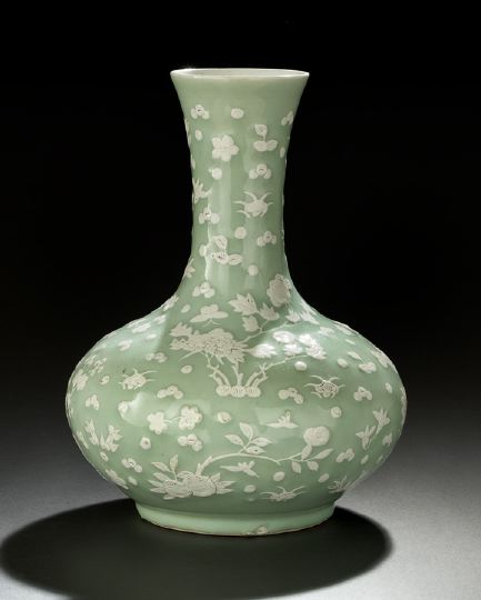 Appraisal: Chinese Molded Porcelain Compressed Bottle Vase modeled as a squat