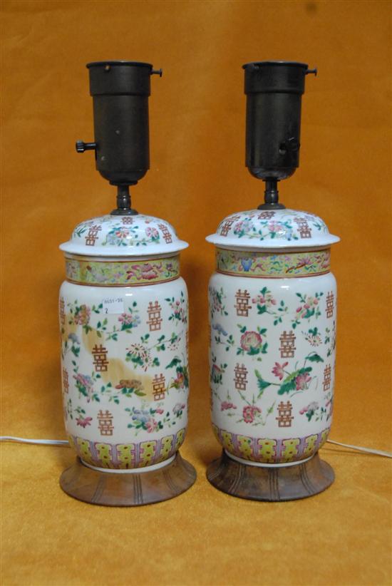 Appraisal: PAIR CHINESE PORCELAIN CYLINDRICAL VASES Floral and character enameled lided