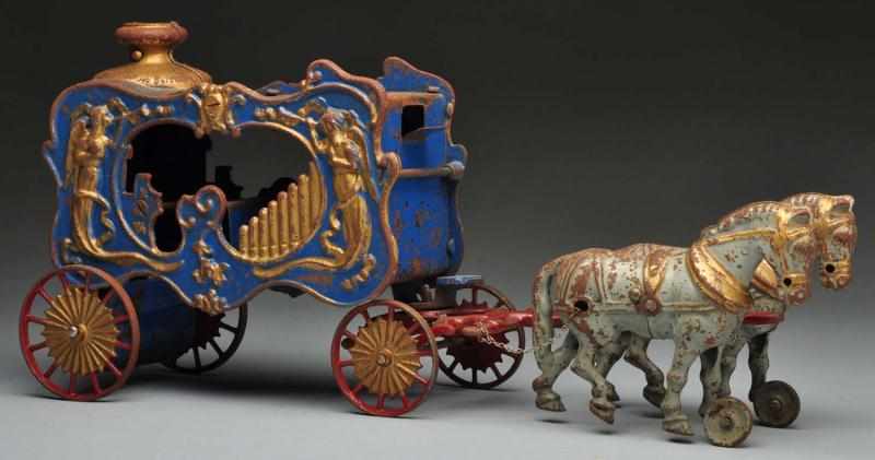 Appraisal: Cast Iron Royal Circus Calliope Horse-Drawn Toy Description American Made